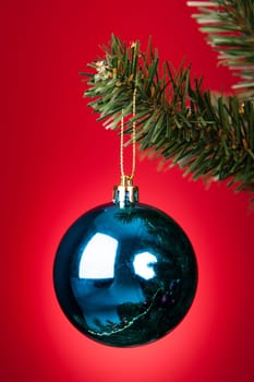 Close-up Of Blue Decorative Bauble Hanged On Christmas Tree