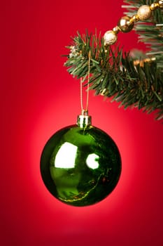 Close-up Of Green Decorative Bauble Hanged On Christmas Tree