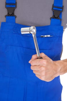 Close-up Photo Of Mechanic Hand Holding Ratchet