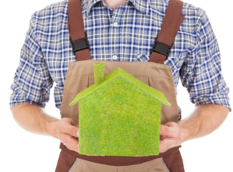 Portrait Of A Construction Worker Holding Green Ecological House