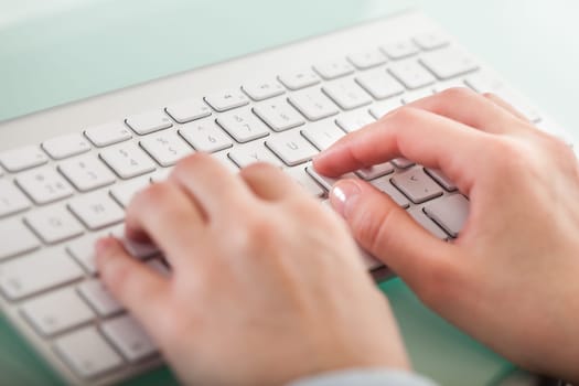 Close-up Photo Of Hands Typing On Keyboard