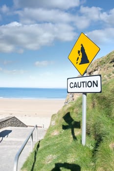 caution loose rocks or landslide sign in Ballybunion beach county Kerry Irelands wild atlantic way