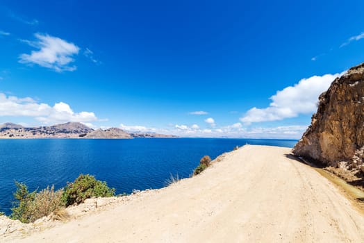 Dirt road along the coast of Lake Titicaca near Copacabana, Bolivia