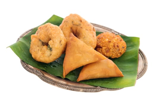 Traditional Indian snack starter isolated on white background.