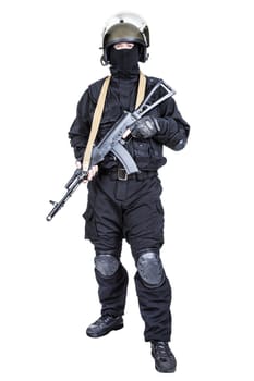 Spec ops soldier in black uniform and face mask with his rifle