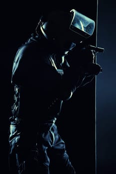 Contour shot of spec ops soldier on black background