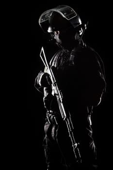 Contour shot of spec ops soldier on black background