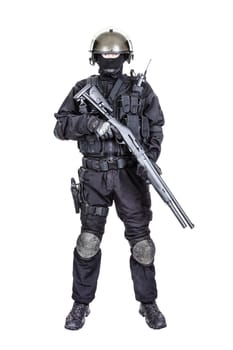 Spec ops soldier in black uniform and face mask with shotgun