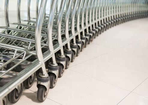 row of shopping cart at a supermarket
