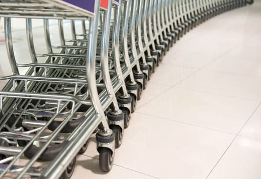 row of shopping cart at a supermarket