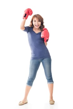 Fighting girl concept, full length portrait of Asian isolated on white.