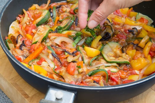 Cooking the typical Provencal meal - Ratatouille. Typical Provencal food