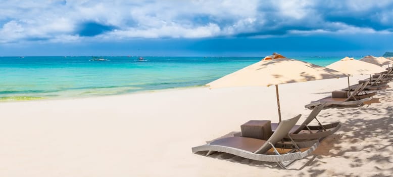 Panoramic view of a white sand beach