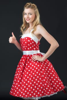 woman in summer dress shows herself successful
