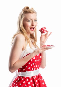 a woman in a summer dress holding a coffee cup