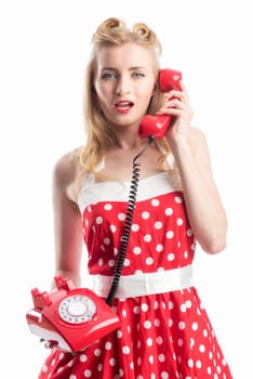 a woman in rockabilly style on the phone with a red phone