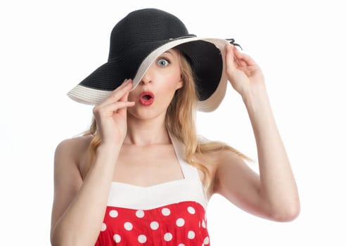 an astonished woman with elegant hat