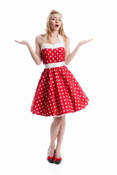 a woman in dotted dress gesticulated with her hands