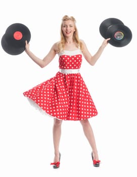 a woman in rockabilly style holds records as advertising space