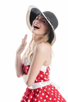 an elegant woman in summer dress and hat flirts