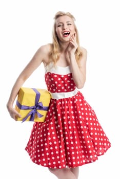 woman in rockabilly style holds a gift