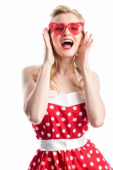 a woman in rockabilly dress wears sunglasses