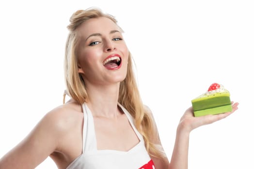 a young blonde woman holding a piece of cake