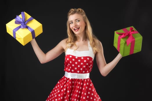 a pin up girl in summer dress keeps gifts
