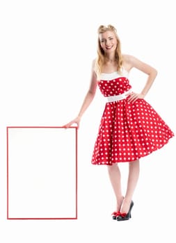a woman in rockabilly style holds an advertising sign