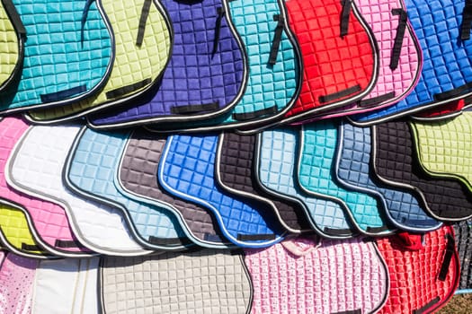 Equestrian Horse saddle covers closeup detail