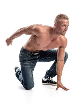 a well-trained young man shows his muscles through various body postures