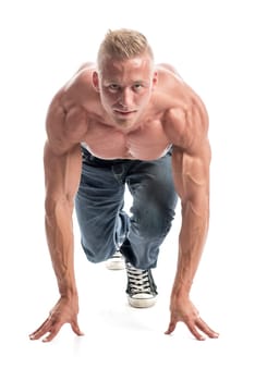a well-trained young man shows his muscles through various body postures