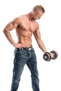 a man with a well-trained body exercises with a dumbbell