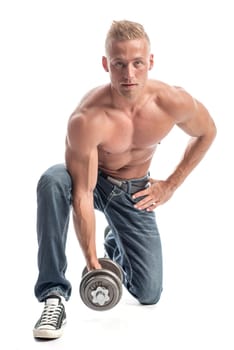 a man with a well-trained body exercises with a dumbbell