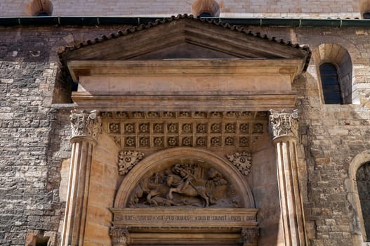Fight with the dragon. Medieval architecture detail at St. George's Basilica, Prague, Czech Republic.