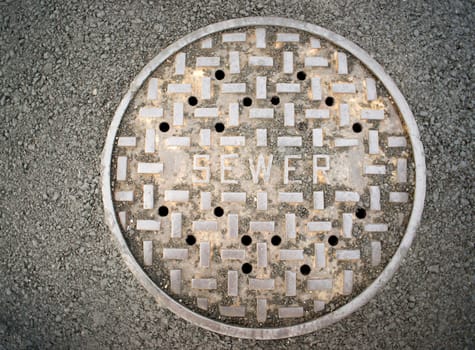 One can even find beauty in a manhole sewer cover