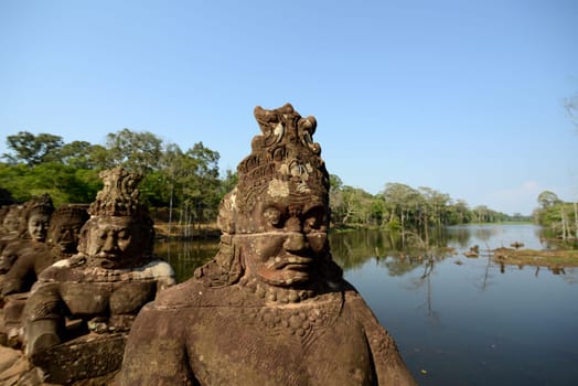The Bridge at the Angkor Tom Gate in the Temple City of Angkor near the City of Siem Riep in the west of Cambodia.
