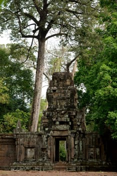 A Gate  in the Angkor Thom  in the Temple City of Angkor near the City of Siem Riep in the west of Cambodia.