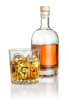 Whisky on the rocks with bottle