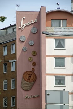 Old bank advertisement on a house facade