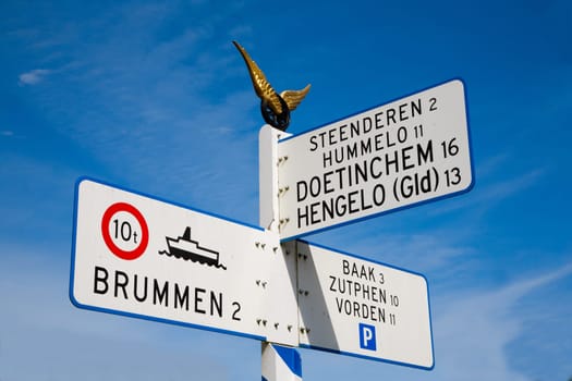 Traditional direction post in The Netherlands.