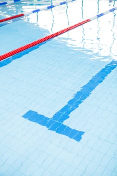 Swimming pool lanes with bottom lane line and ropes