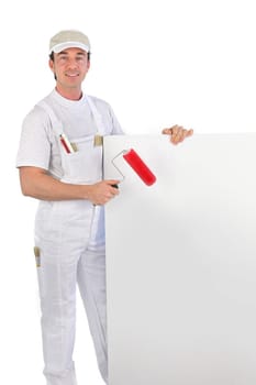 painter with roller and board