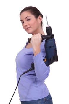 craftswoman holding a drill
