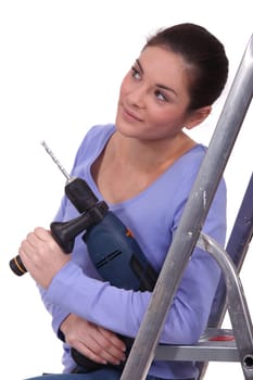 Woman holding a screwdriver