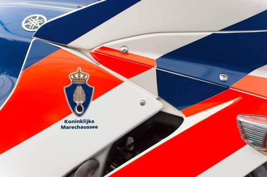 close up of a royal dutch police (marechaussee) motorbike at the Royal Dutch Air Force Days 2014 in Gilze-Rijen. It is one of the four services of the Dutch armed forces.