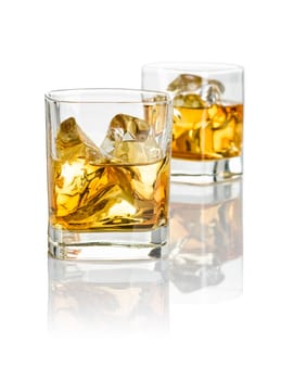 Two tumblers with whiskey