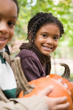 Kids with pumpkins