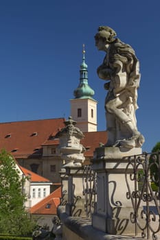 Baroque staues and famous Church of Our Lady of Victory in the background. View from Vrtbovska Garden (Prague)