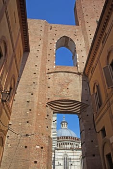 The ancient center of Siena. Famous Cathedral of Siena in the background.